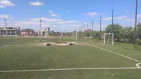 Насчитали более 12 воронок: в ФК Мариуполь отчитались о состоянии тренировочной базы азовцев после ее обстрела российской армией